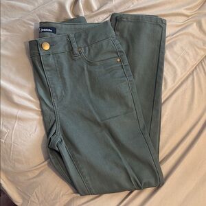 Green Skinny Jeans with Gold Accents